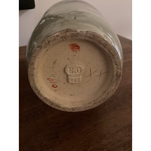 This earthenware vase, signed E.G. for Édouard Gilles, is a remarkable piece from the late 19th century. Renowned for his...