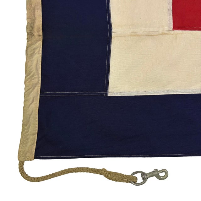 This vintage signal flag is fully sewn from a cotton cloth, and finished with nautical rope and metal hardware. Please...