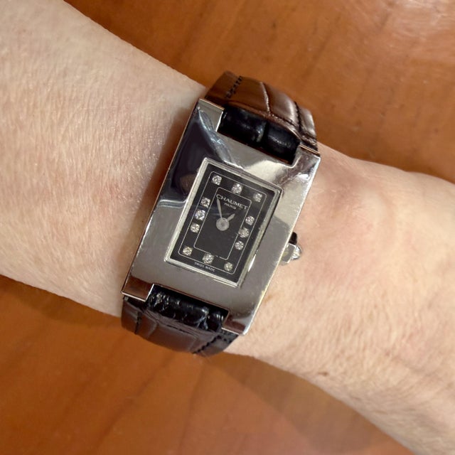 Vintage 1990s Chaumet Paris "Still de Chaumet" ladies quartz watch in stainless steel featuring a rectangular black dial...