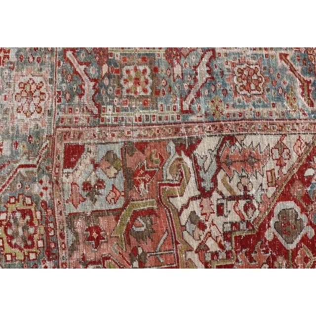 Early 20th Century Antique Persian Heriz Rug With Geometric Medallion Design in Red & Soft Colors For Sale - Image 9 of 12