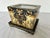Elegant, decorative square planter or cachepot. Black and gold renaissance revival artistry featuring cherubini, coat of...