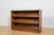 This bookcase was manufactured in Denmark during the 1930s and is designed in the Art Deco style. The piece is...