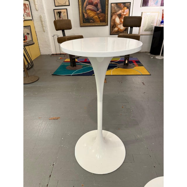 Inspired by the iconic silhouettes of mid-century European design, these pedestal accent tables feature slender stem-like...