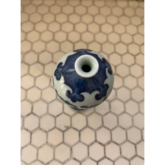 Small Blue & White Porcelain Chinoiserie Vase. Artist stamp underneath.