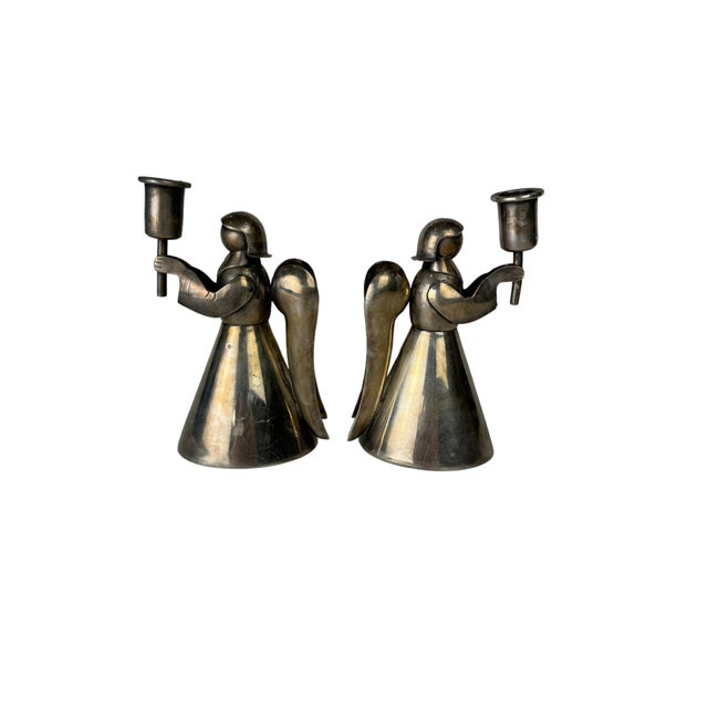 Mid century Los Castillo handwrought candle holders from Taxco, Mexico. Los Castillo silversmiths were established in 1939...