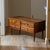 An exceptional and rare "apartment-scale" low storage chest crafted in solid walnut, precision-dated by a factory stamp to...