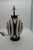 Add a touch of artisan elegance to your home with this stunning handcrafted lamp made from authentic Chulucanas pottery....
