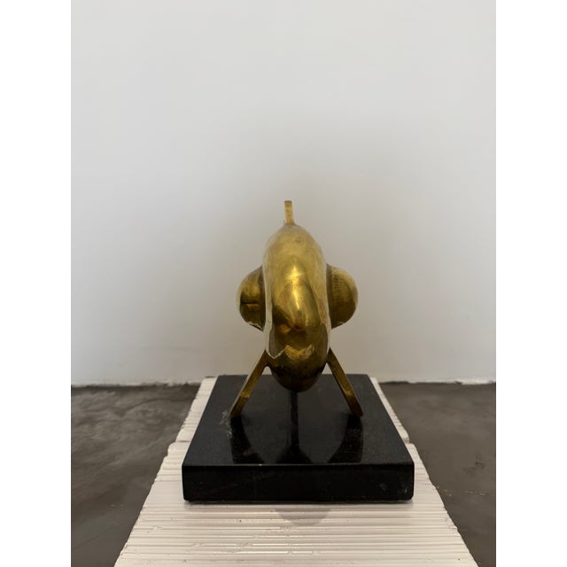 Patinated bronze sculpture of a fish on top a black granite base by Brazilian sculptor E Ferreira Netto, Brazil 1985.
