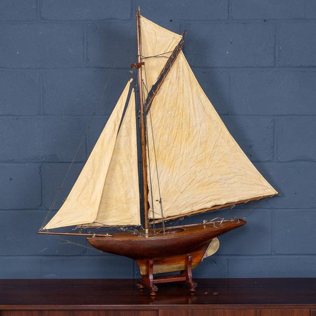 A fantastic antique gaff rigged cutter pond yacht, lovely carved wood hull dating to the first half of the 20th century....