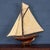 A fantastic antique gaff rigged cutter pond yacht, lovely carved wood hull dating to the first half of the 20th century....