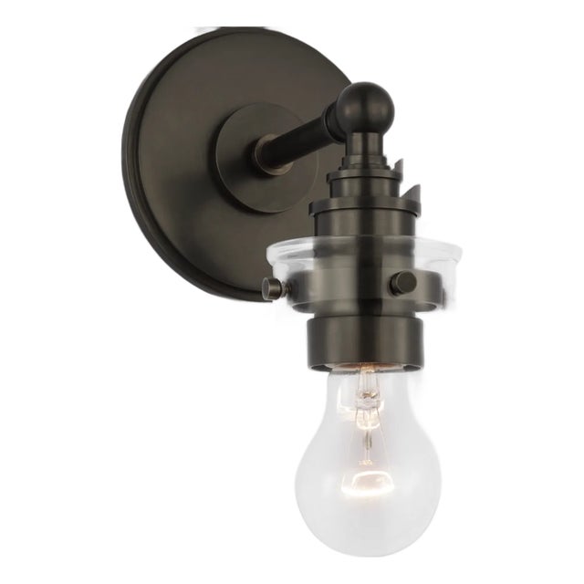 Description: Embodying industrial minimalism with a touch of elegance, the Chapman & Myers Parkington collection merges...