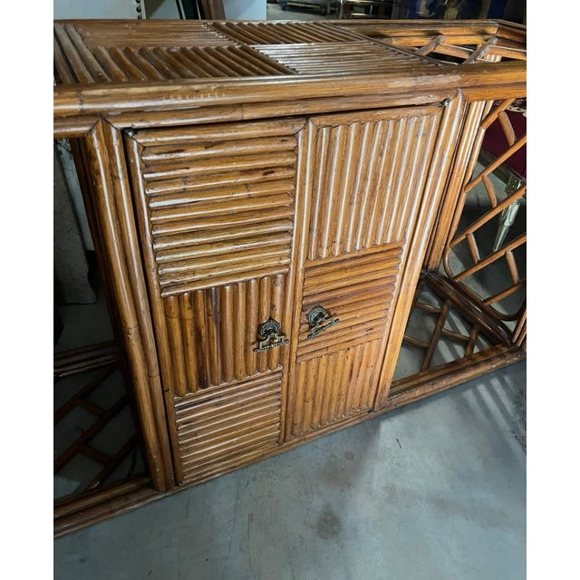 Up for consideration is a beautiful vintage large bamboo console table with storage. This would look lovely in your home,...