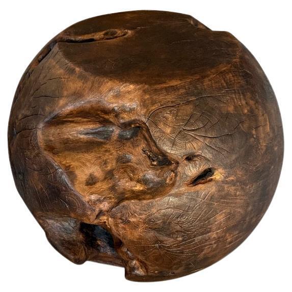 A century old teak root hand carved into a drum shape side table whilst respecting the natural organic wood. Charred one...