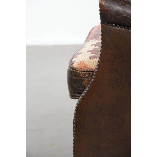 Dark Brown Armchair in Cowhide with a Reversible Kelim Seat Cushion For Sale - Image 16 of 17