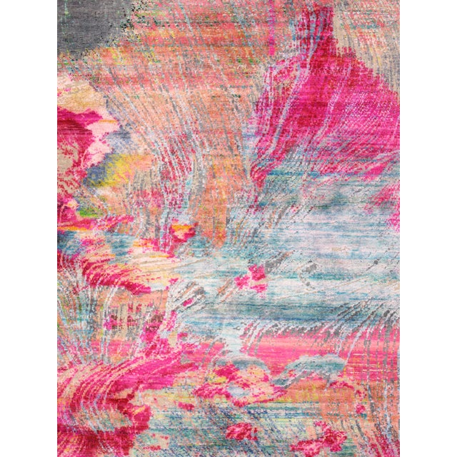 The Modern Collection explores hand-knotted designs through abstract patterning, solid tonal fields, and subtle surface...