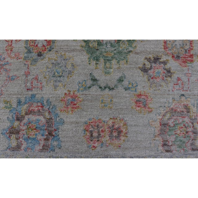 Textile Modern All-Over Floral Oushak With Muted Background and Accent Colors For Sale - Image 7 of 10