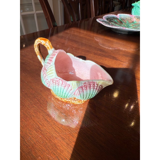 Add a touch of 19th-century charm to your collection with this antique Etruscan Majolica creamer. Beautifully crafted by...