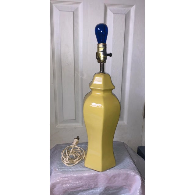 Stunning table lamp with Asian feel. Yellow known as the color of virtue and nobility it is also associated with knowledge...