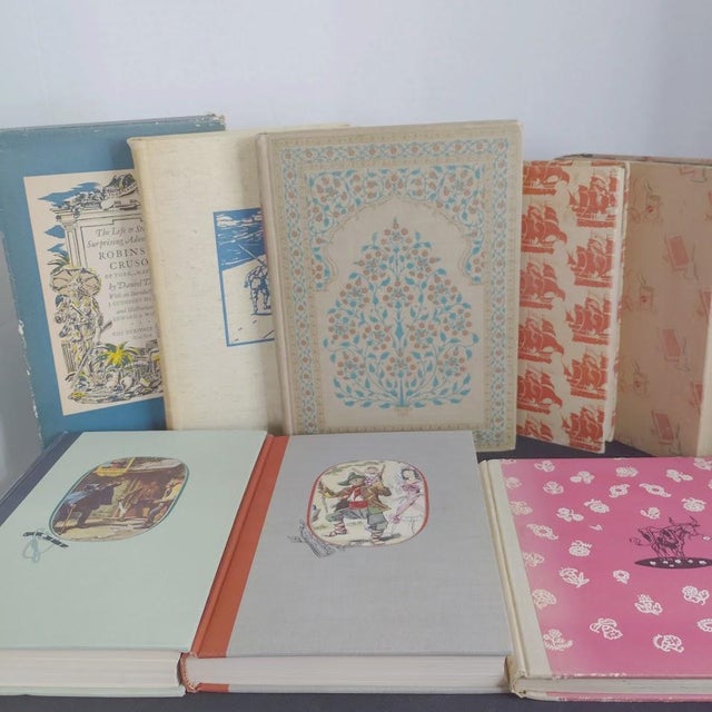 Includes The Adventures of Robinson Crusoe by Daniel Defoe Published by Heritage Press, 1930 Treasure Island by Robert...