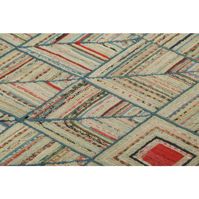 Handmade in wool and originating circa 1920-1930, this 3x3 rug is a rare and exciting new curation in Rug & Kilim’s...
