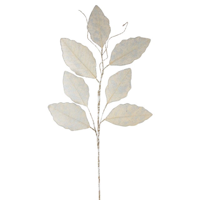 Elevate your holiday decor with the Champagne Magnolia Leaf Spray featuring a stylish silver hue and delicate twig...