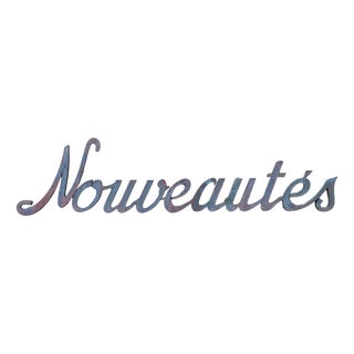 Patinated Nouveautés Sign in Zinc For Sale