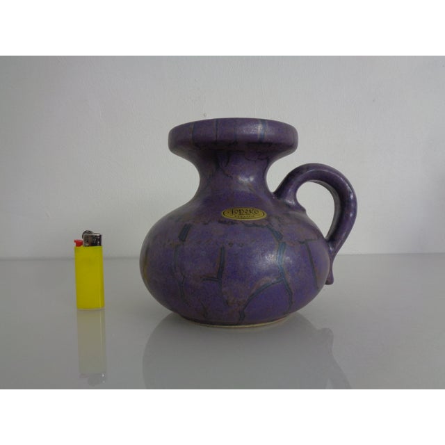 Exceptional purple ceramic Henkel vase by Jopeko from the 1970s. This piece has an attribution mark, I am sure that it is...