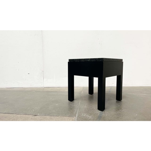 Postmodern side table with pull-out drawer and granite tabletop by Interlübke. Design possibly by Peter Maly. An elegant...