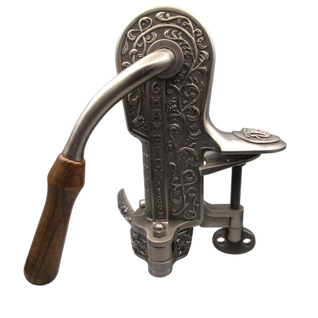 This antique-inspired table clamp Champion 1897 wine opener features intricate vine engravings and a sturdy clamp mount....