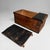 A sober antique Japanese wooden chest with an exceptionally aged surface, warm wood grain, and a deep, natural patina....