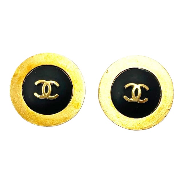 Chanel Vintage Gold Plated CC black Gold Rim Clip on Earrings As seen on Nicole Richie - 2 Pieces For Sale