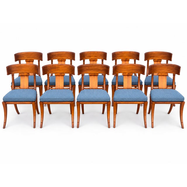 Set of 10 Teak Klismos patio chairs. The chairs are made of solid Peruvian Teak. Finished and ready to enjoy. Set is well...