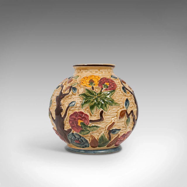 This is a small vintage decorative vase. An English, ceramic baluster urn with the popular Indian Tree decorative pattern,...