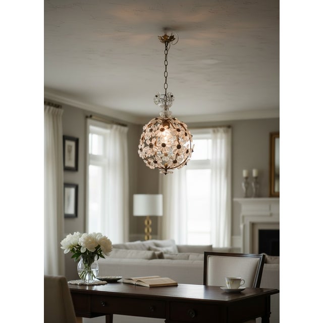 An enchanting vintage mid-century sphere or cage chandelier, heavily influenced by the iconic designs of Maison Baguès....
