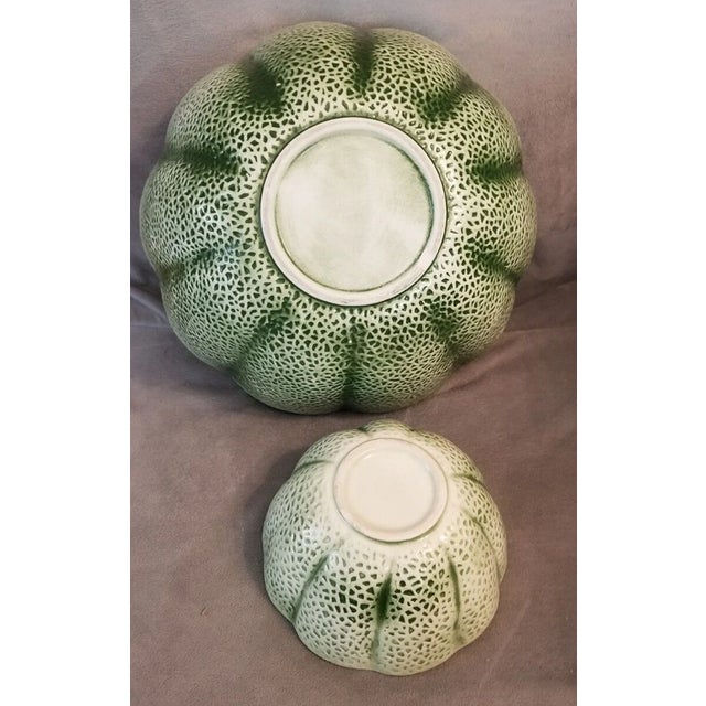 Handcrafted with incredible realism, these bowls boast a textured green rind exterior that mimics a fresh cantaloupe's...