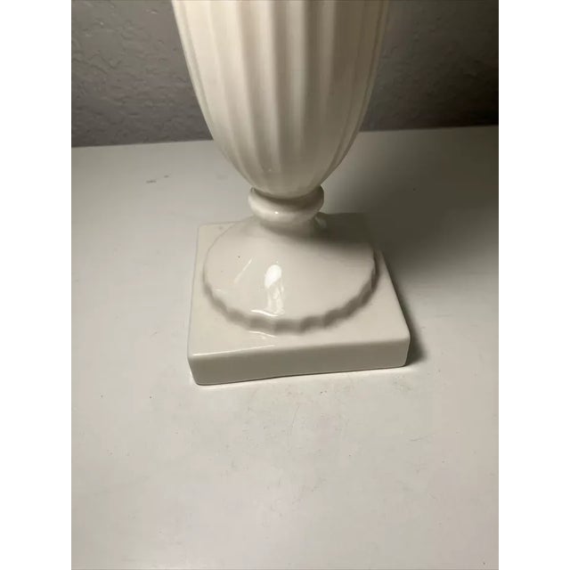 Bring timeless elegance to your home with this vintage Lenox ivory porcelain vase, featuring a graceful tulip-inspired...