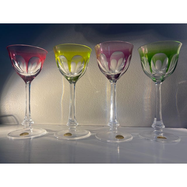 Elegant crystal wine glasses- set of 4- in their original boxes. Original quality control cards. Beautifully visual....