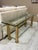 A distinguished Mid-Century Modern console table attributed to Mastercraft, celebrated for its architectural proportions...