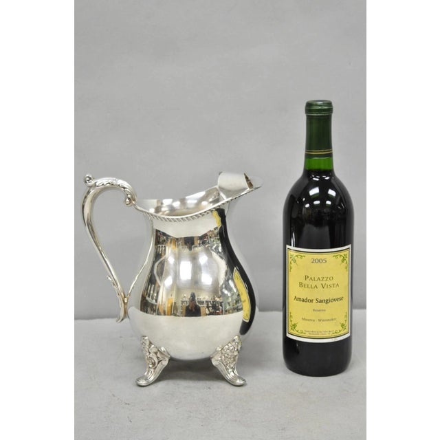 Vintage Bristol by Poole Silver Plated Bulbous Footed Ice Lip Lemonade Water Pitcher. Circa Mid 20th Century....