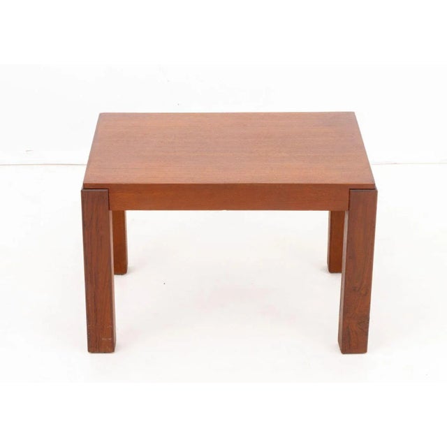 Mid-Century Modern Walnut Side Table, on four block legs. 16.25" H x 24.25" W x 18.25" D. Provenance: From the Collection...