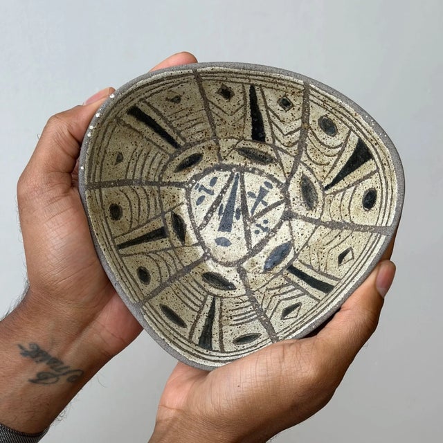 Vintage Triangular Stoneware Bowl with Geometric Glaze Detailing, Circa 1970s. Triangular molded form with a cream and...