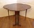Circa 1840s turtle top Sutherland table, English. Highly figured walnut veneers & solids. The legs are fluted & beaded....
