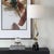 This Cordless Table Lamp Presents A Captivating Visual With Its Fluidly Twisting Metal Base In Antique Brass, Ascending...