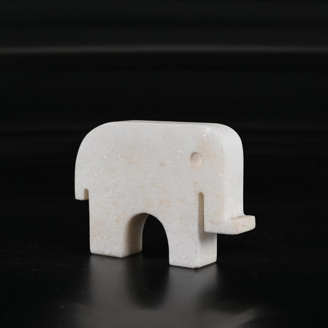 Rare set of three Carrara marble sculptures by Fratelli Mannelli, an Elephant, a Giraffe and a Camel. This set is...