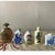 A fine collection of five vintage Chinese snuff bottles, featuring a variety of materials and classical motifs. This lot...
