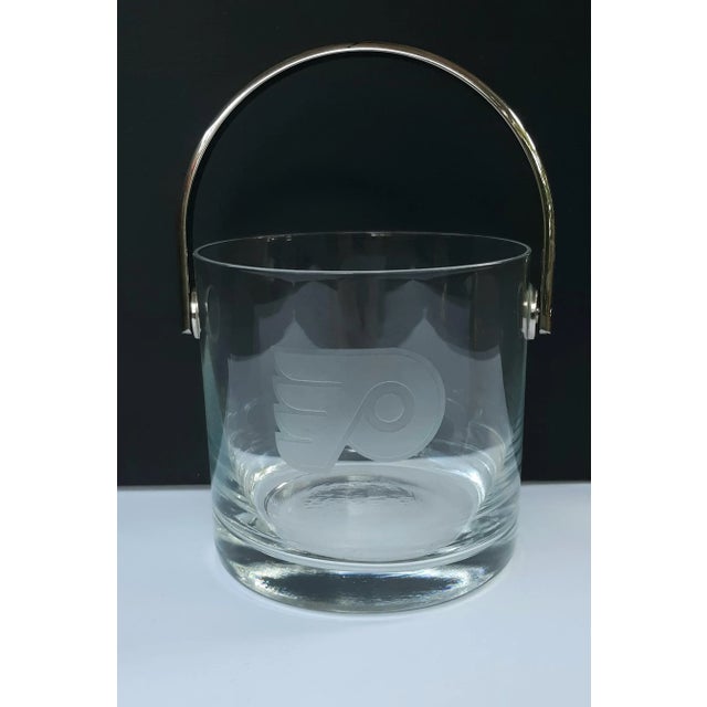 Modern glass ice bucket with etching in glass. Believed to be Philidelphia Flyers.