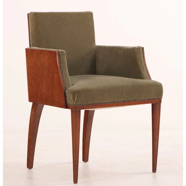 A fantastic and sculpture French Deco Armchair c.1940s in the Manner of Émile-Jacques Ruhlmann. The chairs retains its...