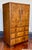Vintage Art Deco/Moderne Walnut Highboy Dresser with a book-matched burl walnut veneer front. Upper half of the cabinet...