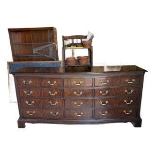 Mid 20th Century Drexel Heritage Flame Mahogany Serpentine Dresser With 12 Drawers For Sale