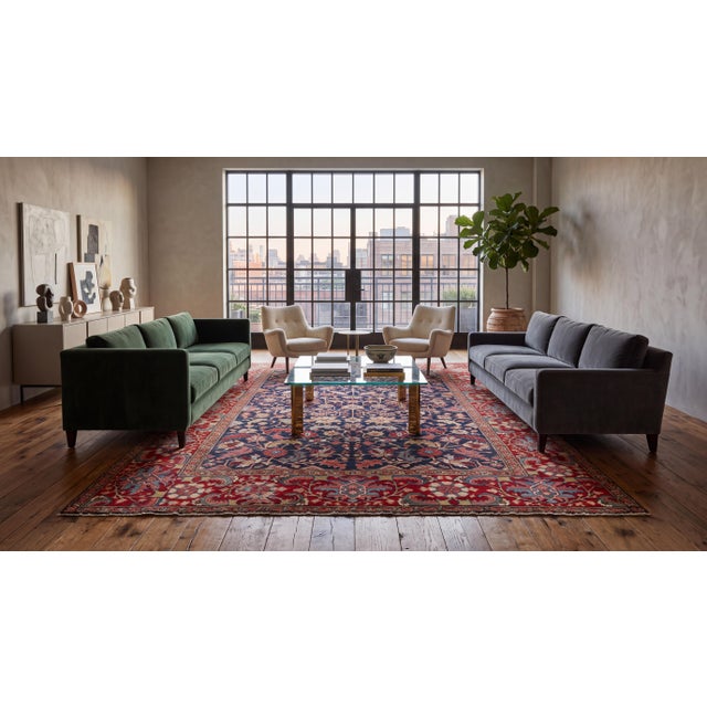 An exceptional example of late 19th-century craftsmanship, this Antique Heriz Style rug showcases an intricate, all-over...